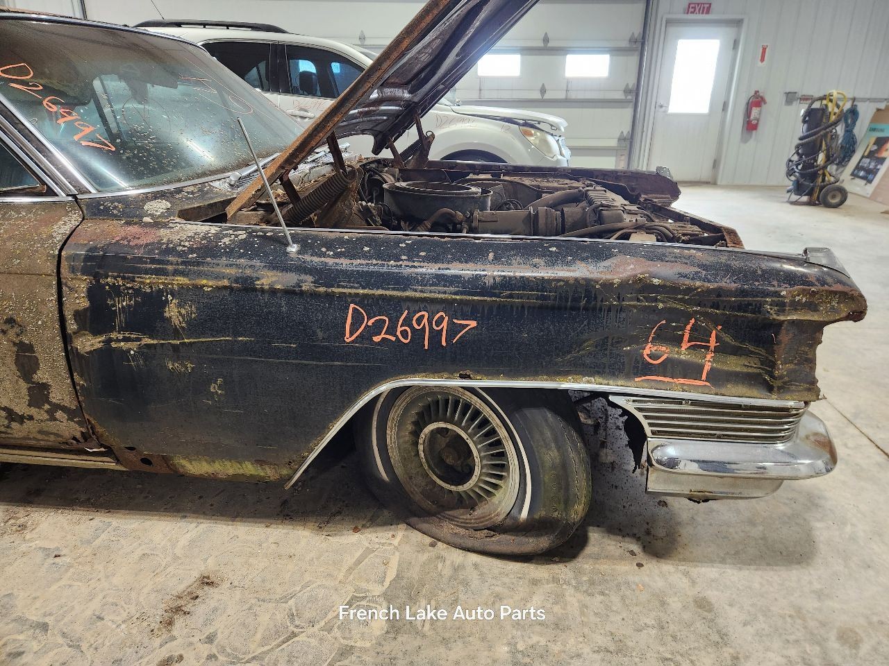 Driver Left Headlight Trim Ring Fits 1964 CADILLAC 60S 1342723