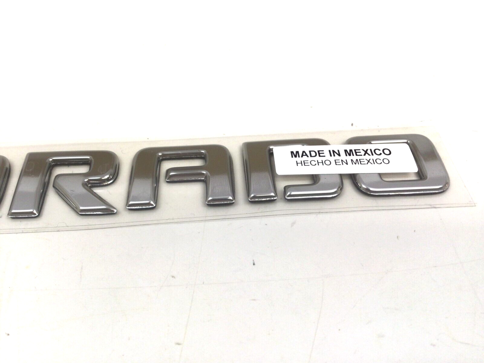 04-06 Chevrolet Colorado front RH or LH Side Door Colorado Nameplate chrome OEM