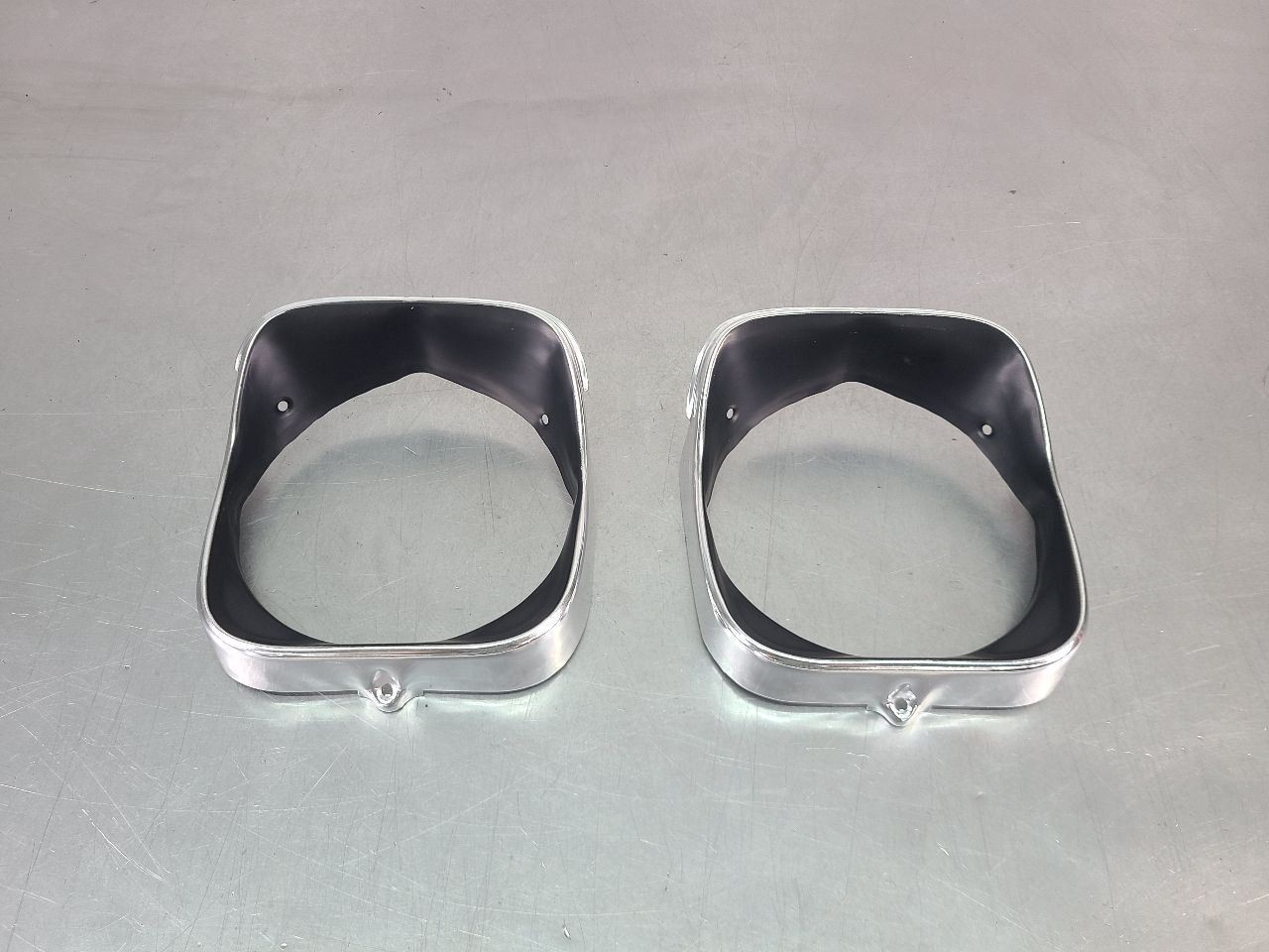 1969 CHEVELLE HEADLAMP BEZEL NEW LH PAIR DRIVERS SIDE. M1397