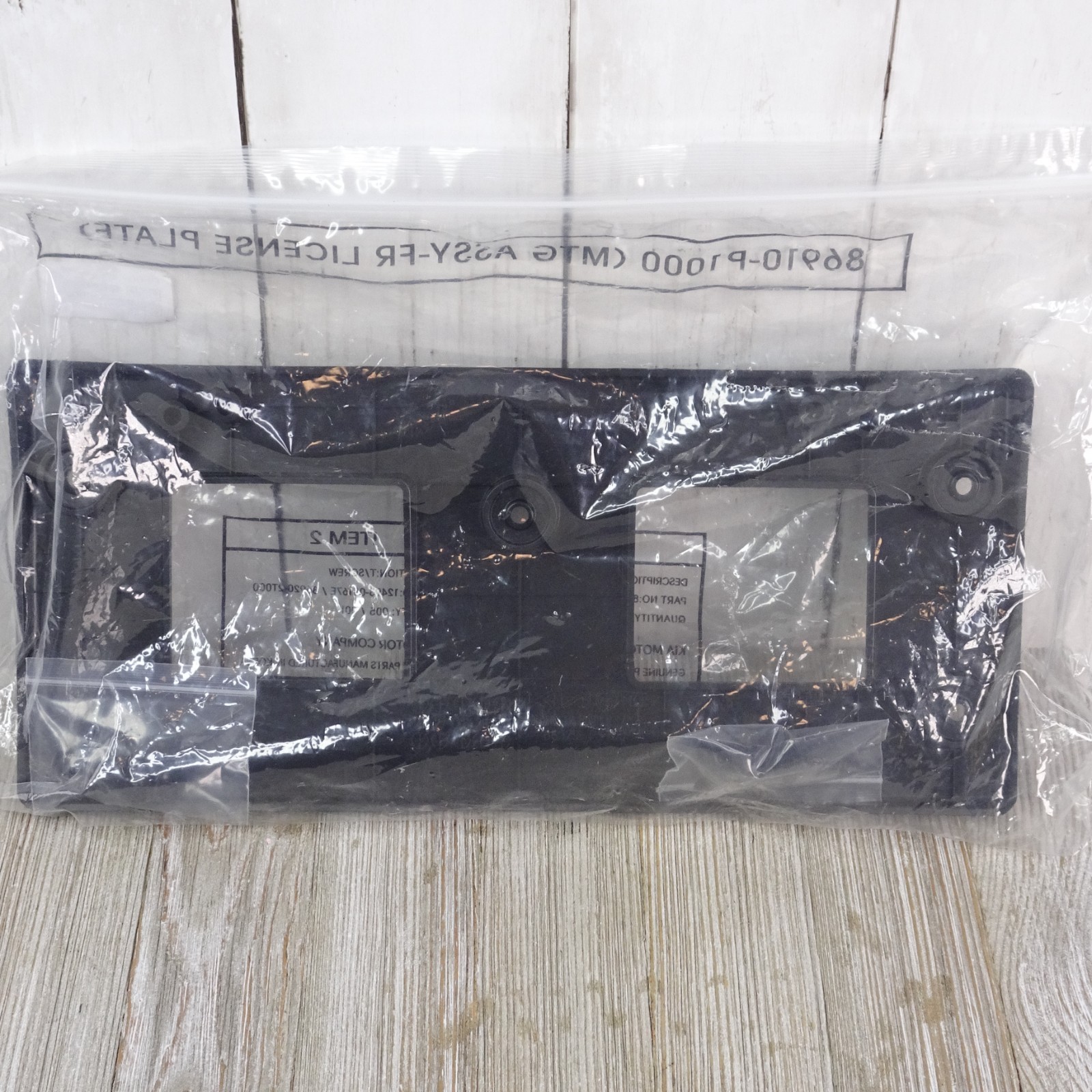 OEM NEW 2023 2024 KIA SPORTAGE FRONT BUMPER LICENSE PLATE BRACKET HOLDER