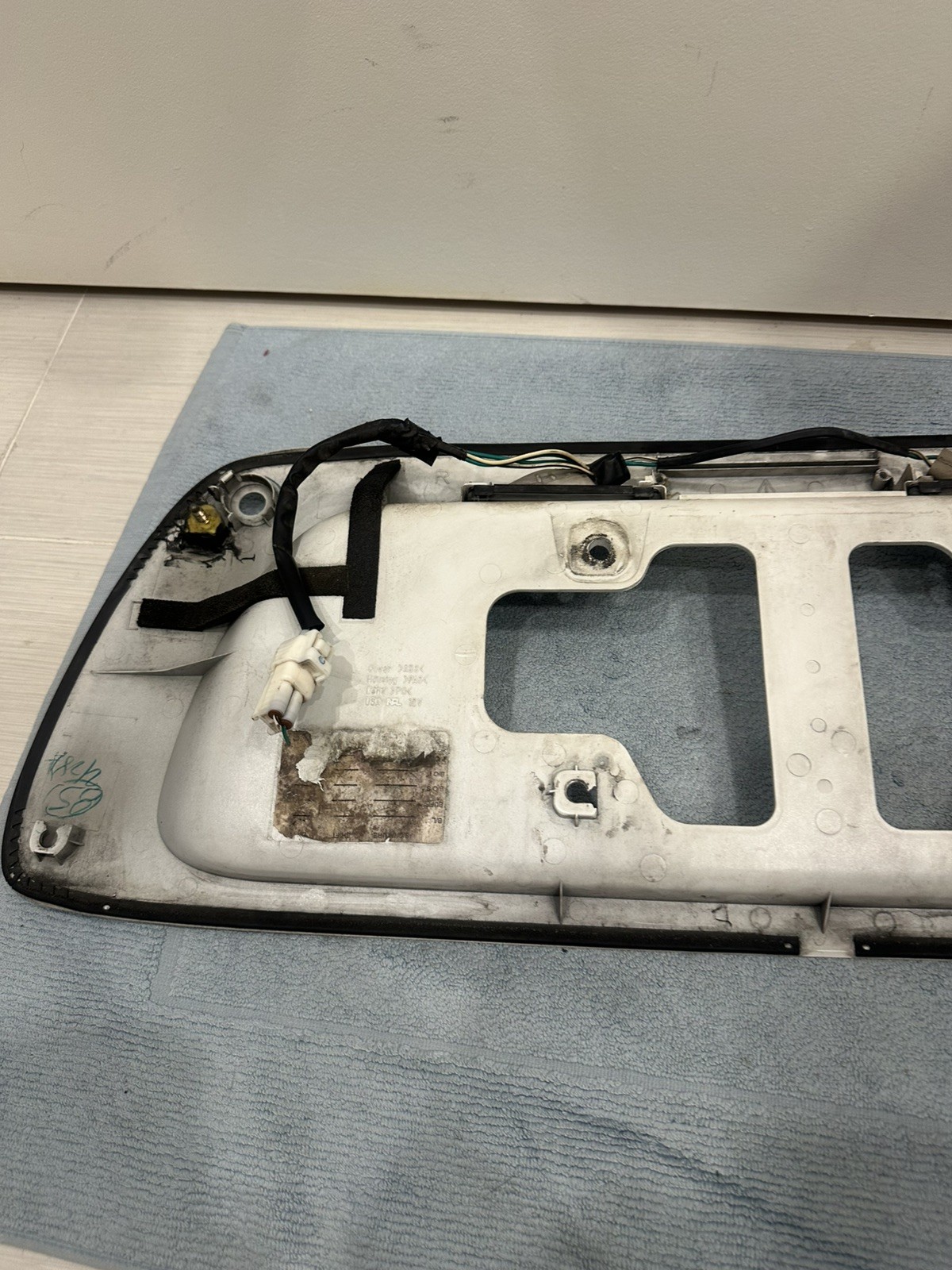 2001 – 2007 Toyota Sequoia Rear Lift Gate Hatch License Plate Trim White OEM
