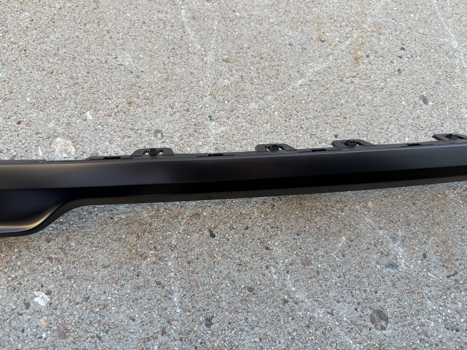 2022-2025 Rivian R1S Rear Bumper Center Moulding Gunmetal Finish Strip Trim OEM