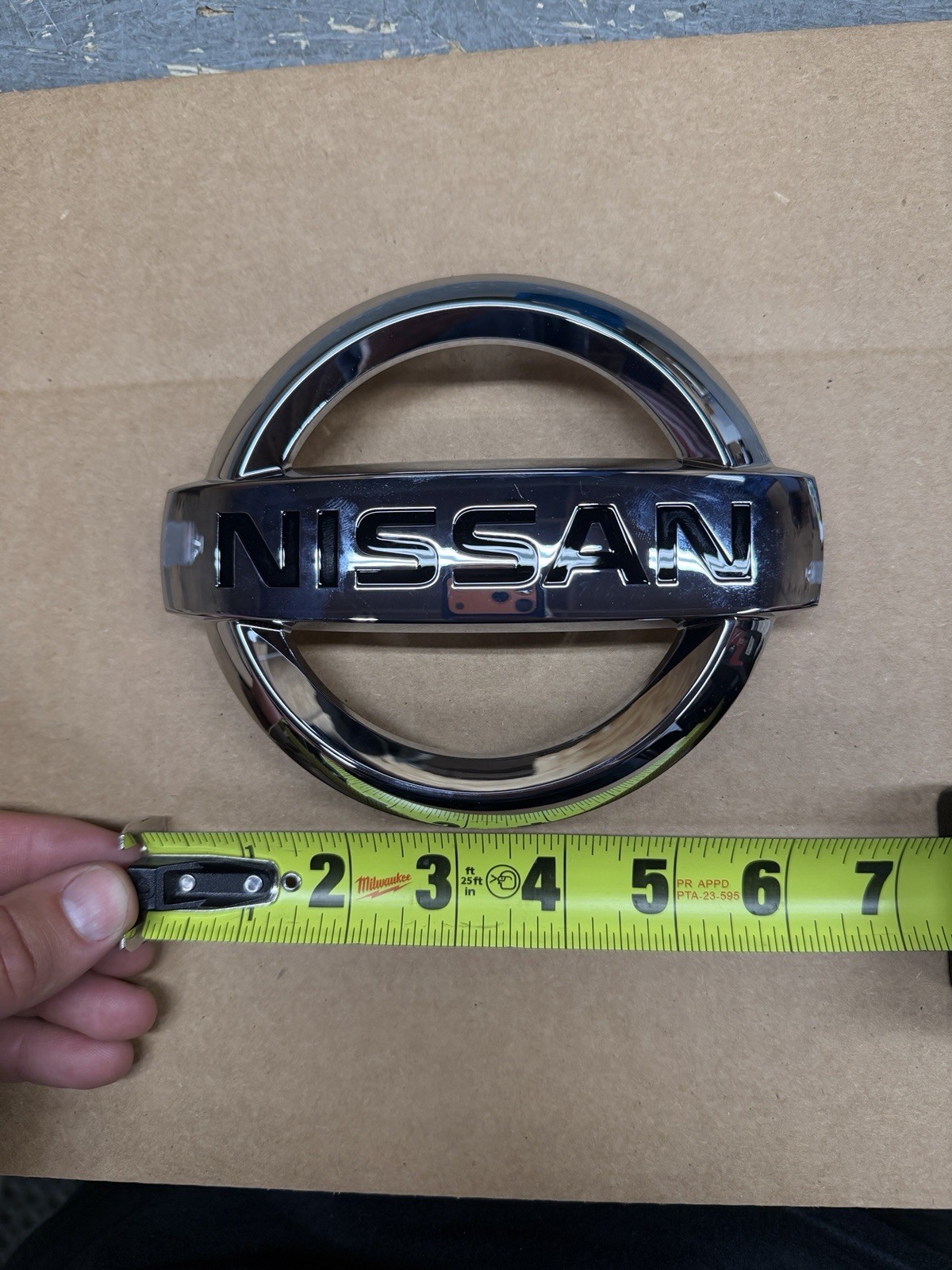 NEW OEM 11-23 Nissan Altima Murano Rogue Quest Maxima Front Grill Chrome Emblem