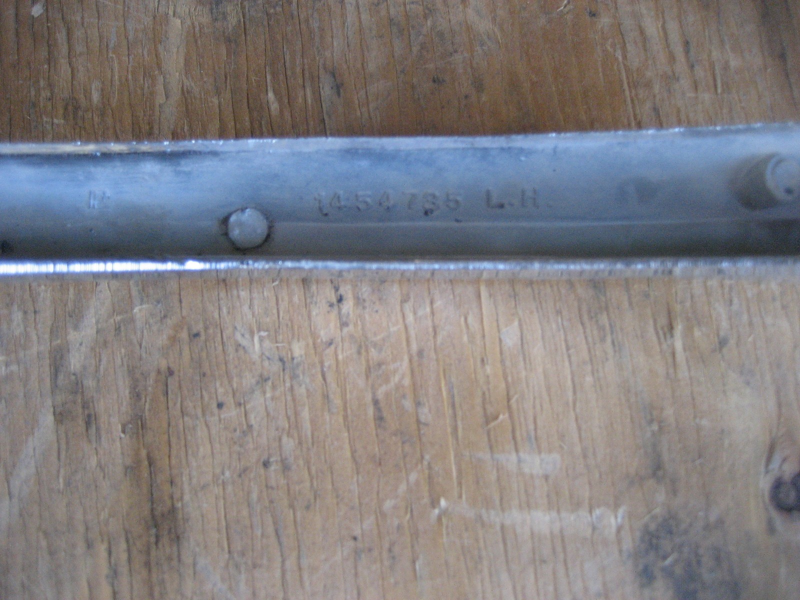1949 CADILLAC LOWER LEFT FOG LIGHT BEZEL FRAME-ORIGINAL 1454735 LH