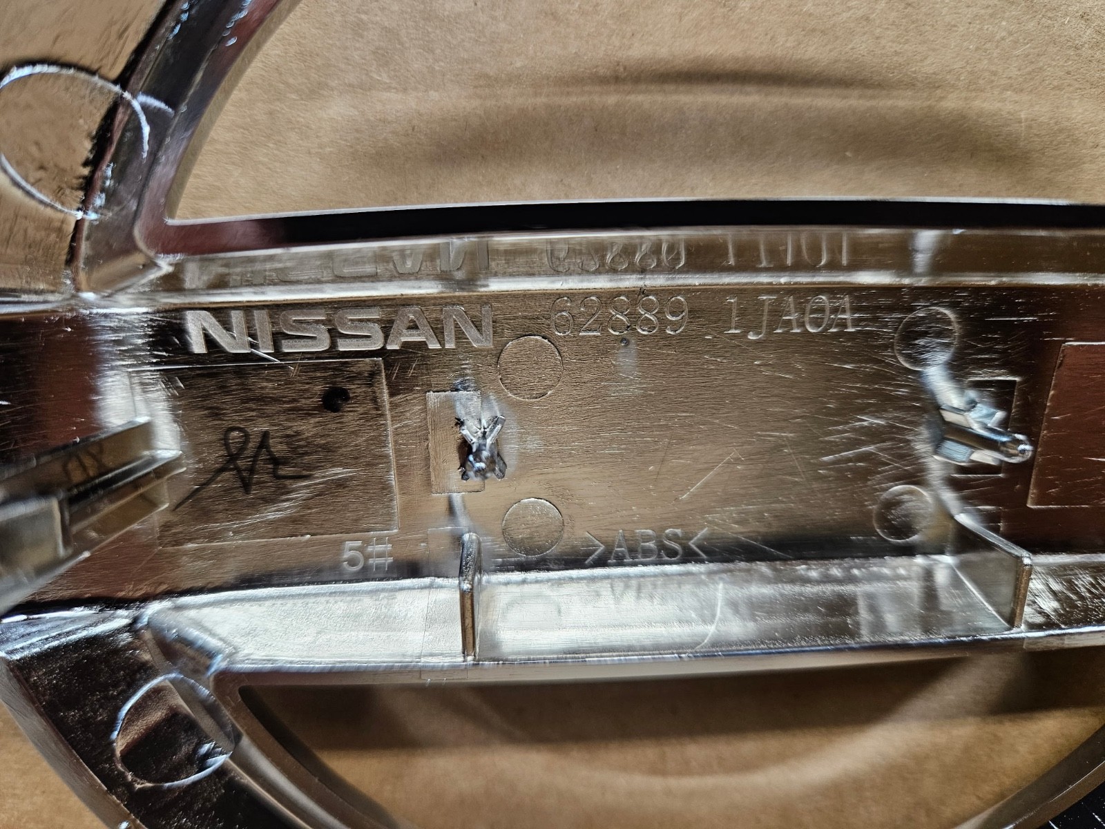 NEW OEM 11-23 Nissan Altima Murano Rogue Quest Maxima Front Grill Chrome Emblem