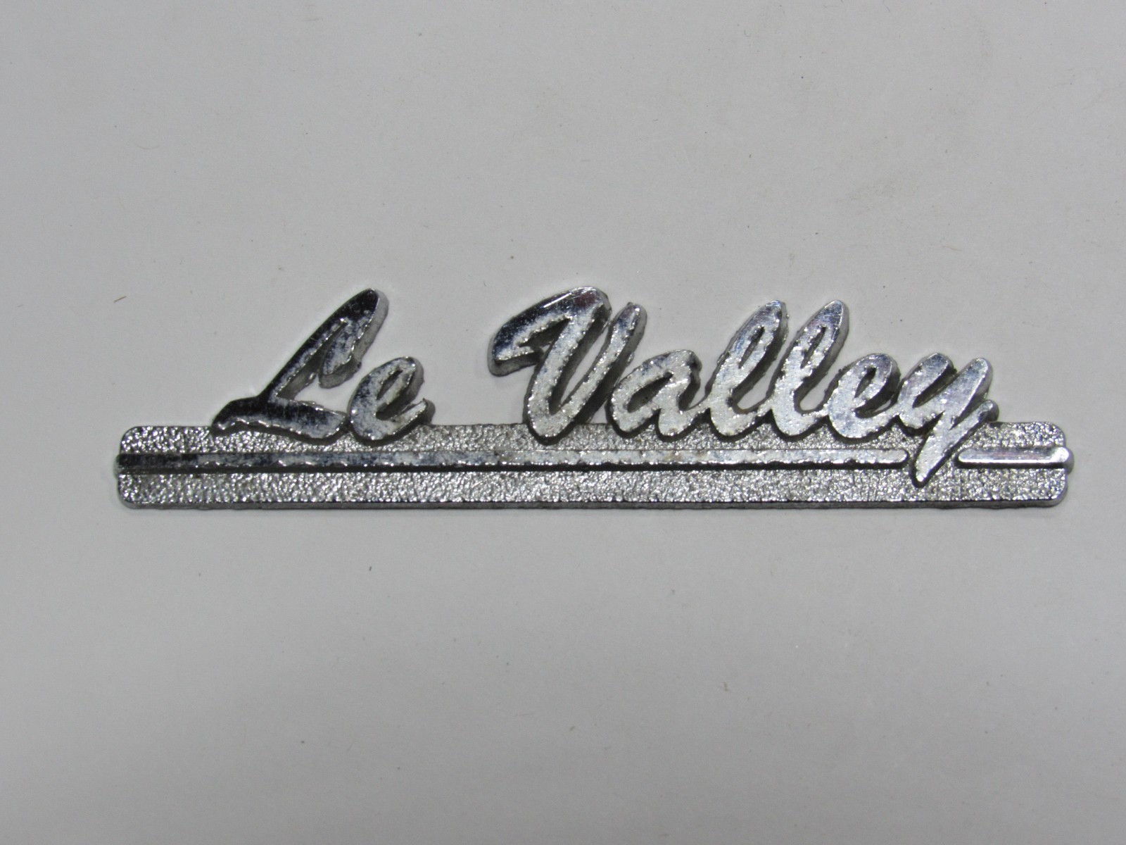 VTG LeValley Chevrolet Fair Plain Michigan Metal Dealership Badge Emblem Tag Oil