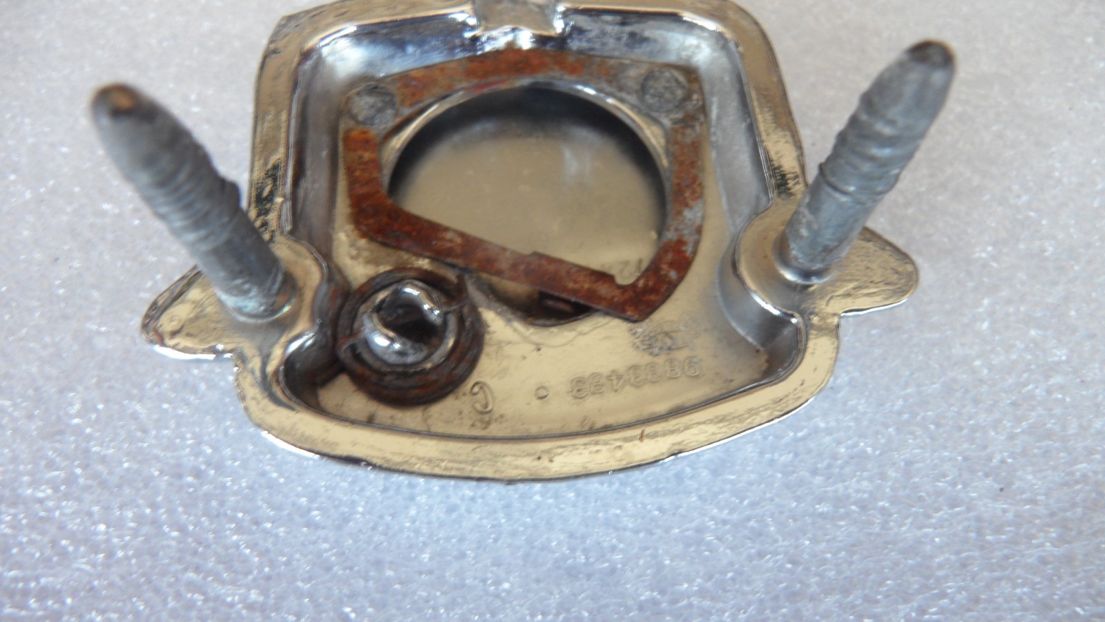 1971-1978 Cadillac original trunk lock cover – nice