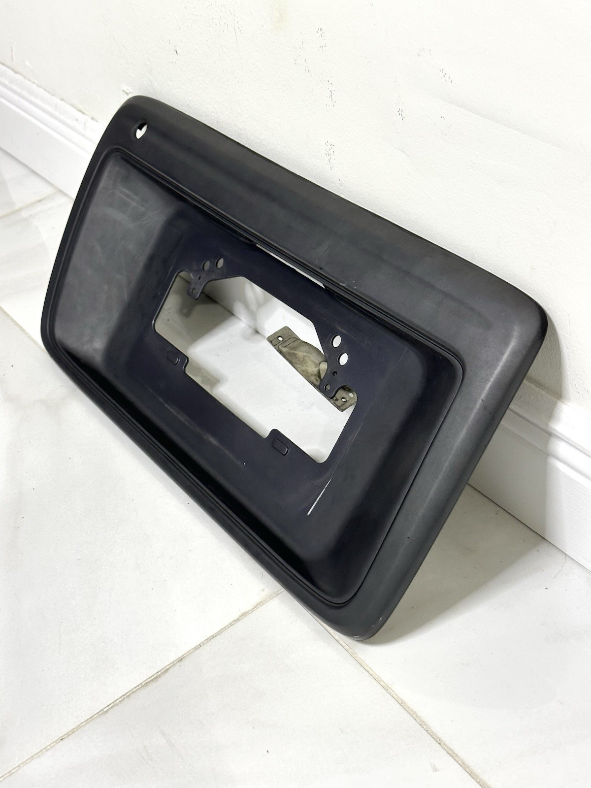 96-02 Toyota 4Runner License Plate Garnish Bracket Trim Mount Cover Genuine OEM