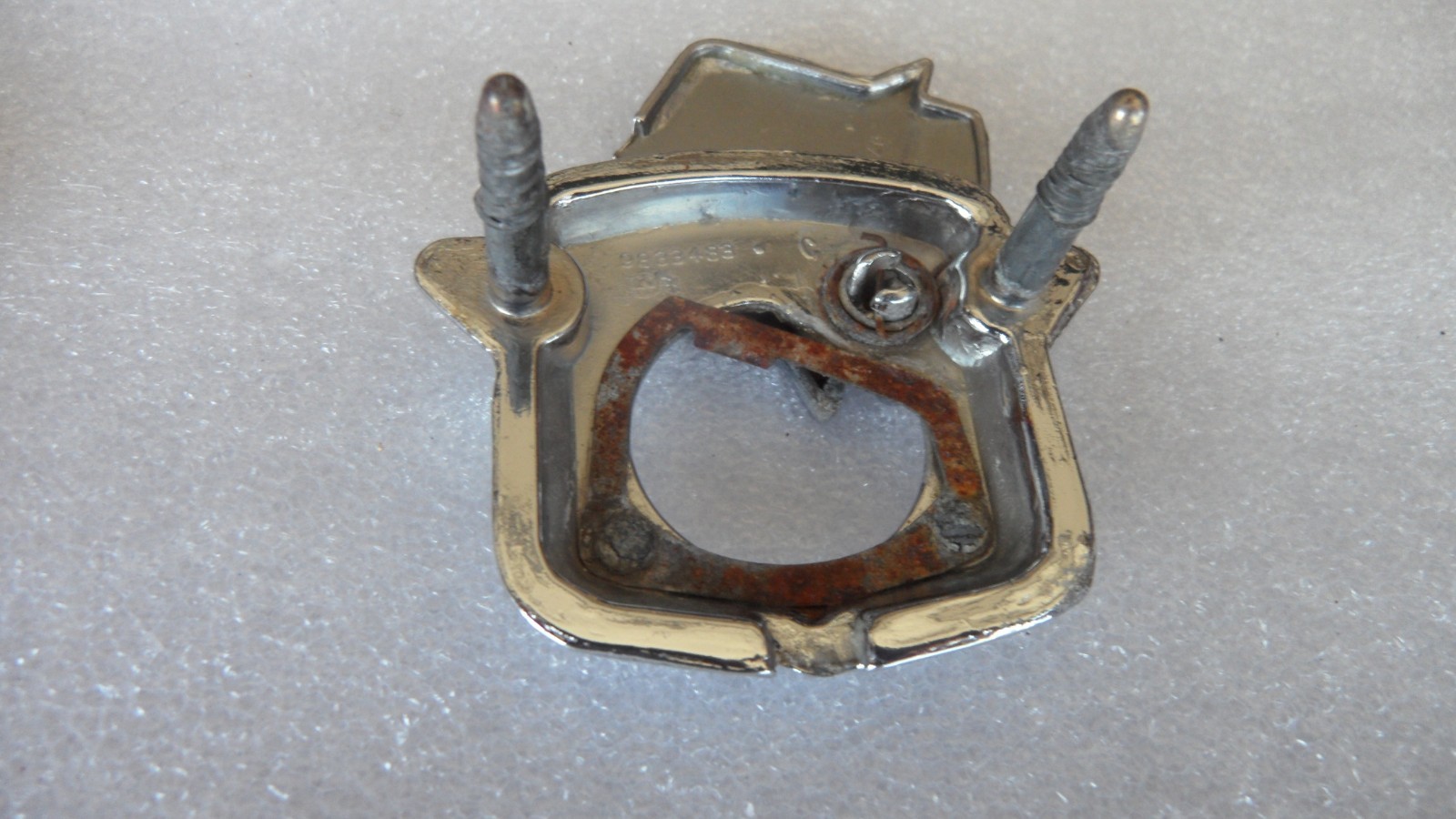 1971-1978 Cadillac original trunk lock cover – nice