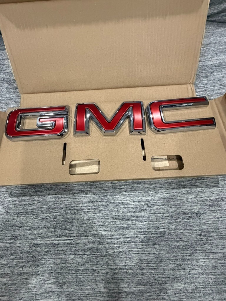 GMC Front OEM Red Emblem and Tail Chrome with Black Badge for Yukon AT4 2026