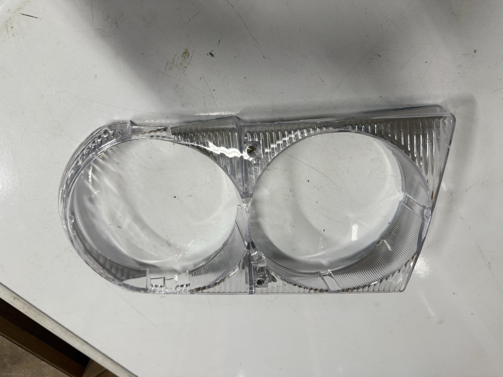 Headlight Door Bezel URO Parts 1078260389