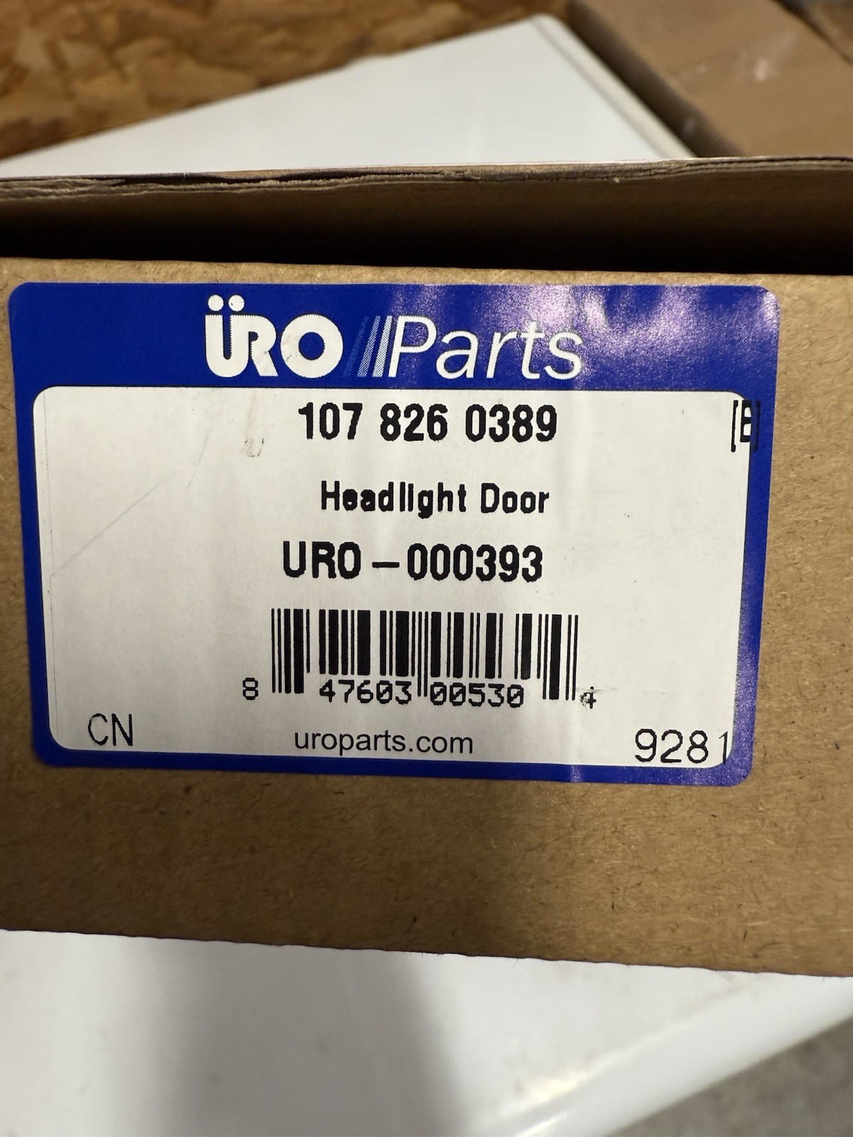 Headlight Door Bezel URO Parts 1078260389