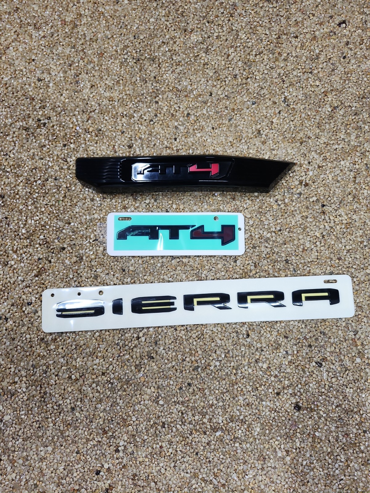 2023-2024 GMC Sierra AT4 Emblems in Black GM OEM NEW 86532078