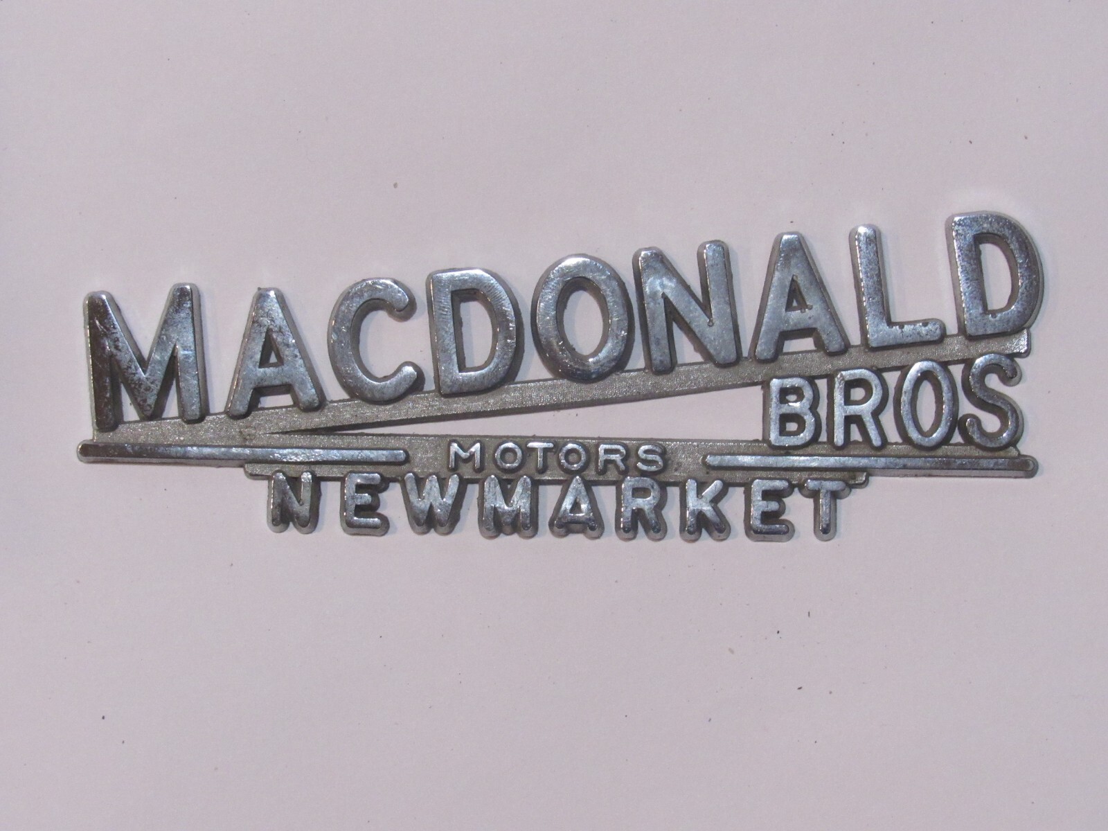 VTG MacDonald Bros Newmarket Ontario Canada Metal Dealership Badge Emblem Tag