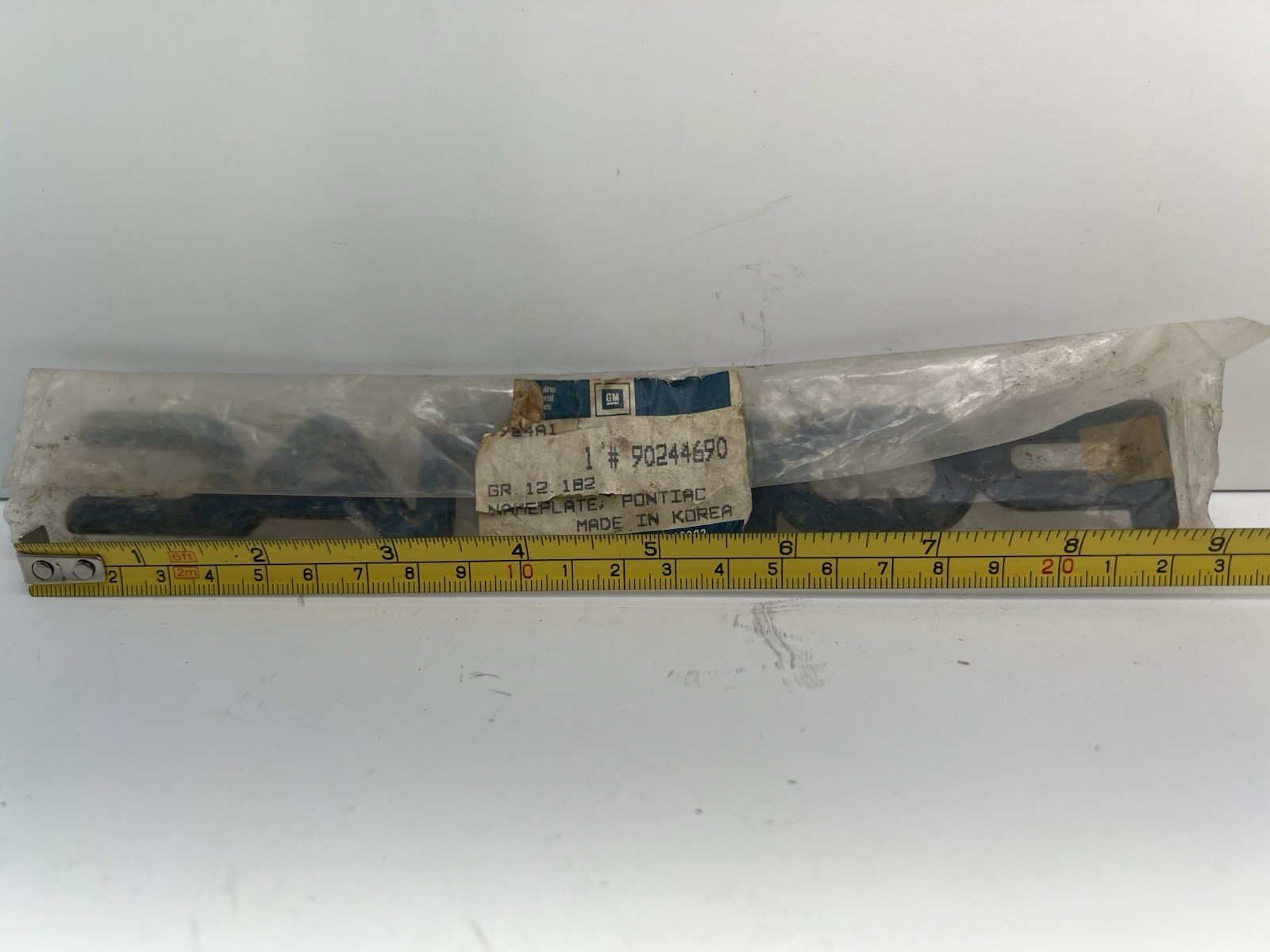 NOS GM Genuine General Motors 1988-93 Pontiac LeMans Nameplate Emblem GM90244690