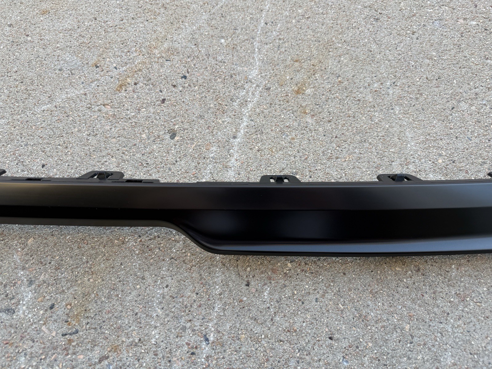 2022-2025 Rivian R1S Rear Bumper Center Moulding Gunmetal Finish Strip Trim OEM