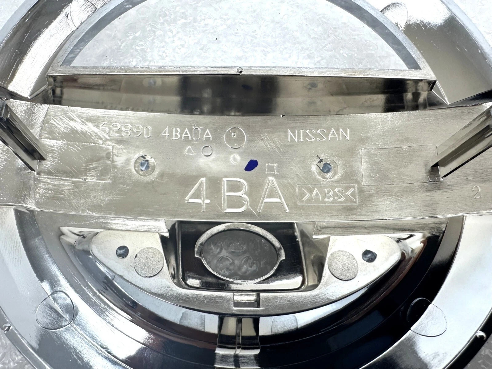 FRONT GRILLE EMBLEM For NISSAN MURANO ROGUE (W/CAMERA SPOT) 62890-4BA0A