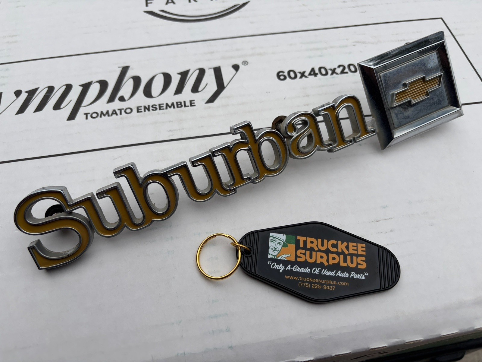75-87 Chevrolet GMC C/K Suburban Rear Door Emblem Badge